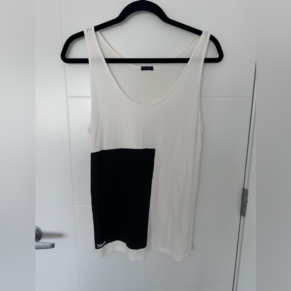 Annette Gรถrtz White and Black Sleeveless Tank Top with Minimalist Design